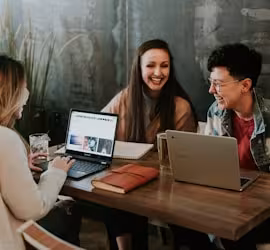 people at a table talking